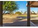 View of a lush green golf course from the backyard at 13708 W Robertson Dr, Sun City West, AZ 85375