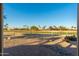 Scenic backyard view overlooking a golf course at 13708 W Robertson Dr, Sun City West, AZ 85375