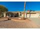 Tan one-story house with tile roof, landscaping, and driveway at 13708 W Robertson Dr, Sun City West, AZ 85375