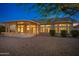 Single story home with covered patio and desert landscaping at 13708 W Robertson Dr, Sun City West, AZ 85375