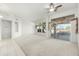 Living room with view of the backyard and golf course at 13708 W Robertson Dr, Sun City West, AZ 85375