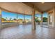 Covered patio with golf course view at 13708 W Robertson Dr, Sun City West, AZ 85375