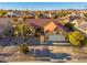 Single-story home with a red tile roof and landscaped yard at 14328 W Dusty Trail Blvd, Sun City West, AZ 85375