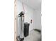 Utility room with water softener and fire extinguisher at 14328 W Dusty Trail Blvd, Sun City West, AZ 85375