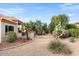 Expansive backyard with desert plants and gravel at 14414 W Wagon Wheel Dr, Sun City West, AZ 85375