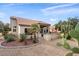 Attractive home exterior with desert landscaping at 14414 W Wagon Wheel Dr, Sun City West, AZ 85375