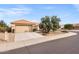 House exterior with a two-car garage and driveway at 14414 W Wagon Wheel Dr, Sun City West, AZ 85375