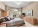 Spacious main bedroom with ample light and built-in cabinetry at 14414 W Wagon Wheel Dr, Sun City West, AZ 85375