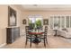 Casual dining area with table and chairs, adjacent to the Gathering room at 1534 E Sweet Citrus Dr, Queen Creek, AZ 85140