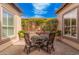 Charming courtyard with seating area and water feature at 1534 E Sweet Citrus Dr, Queen Creek, AZ 85140