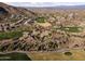 Aerial view of a luxury community with a golf course at 15831 E Thistle Dr, Fountain Hills, AZ 85268