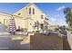 Outdoor kitchen, seating area, and partial pool view at 15831 E Thistle Dr, Fountain Hills, AZ 85268