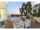 Evening view of a backyard oasis with a pool and patio furniture at 15831 E Thistle Dr, Fountain Hills, AZ 85268