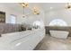 Luxurious bathroom with a soaking tub and double vanity at 15831 E Thistle Dr, Fountain Hills, AZ 85268