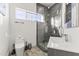 Modern bathroom with a walk-in shower and floating vanity at 15831 E Thistle Dr, Fountain Hills, AZ 85268