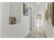 Bright hallway with artwork and tile flooring at 15831 E Thistle Dr, Fountain Hills, AZ 85268