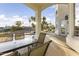 Covered patio with outdoor dining set and pool view at 15831 E Thistle Dr, Fountain Hills, AZ 85268