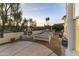 Relaxing patio with fireplace and seating area at 15831 E Thistle Dr, Fountain Hills, AZ 85268