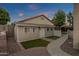 Well maintained storage shed with walkway and small lawn area at 1570 W Bartlett Way, Chandler, AZ 85248