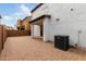 Spacious backyard with brick pavers and a covered patio at 1685 S Wallrade Ln, Gilbert, AZ 85295