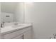 Simple bathroom with white vanity, quartz countertop, and a rectangular sink at 1685 S Wallrade Ln, Gilbert, AZ 85295