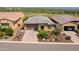 Single story home with garage and desert landscaping at 17676 E Woolsey Way, Rio Verde, AZ 85263