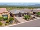 Single-story home with front yard landscaping and mountain views at 17676 E Woolsey Way, Rio Verde, AZ 85263