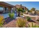 Backyard patio features a water fountain and seating area at 17676 E Woolsey Way, Rio Verde, AZ 85263