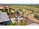 Landscaped patio with seating area, water feature, and mountain views at 17676 E Woolsey Way, Rio Verde, AZ 85263