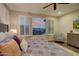 King-size bed, mountain views, and stylish decor in this bedroom at 17676 E Woolsey Way, Rio Verde, AZ 85263