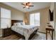 Comfortable bedroom with a queen bed and ceiling fan at 17676 E Woolsey Way, Rio Verde, AZ 85263