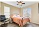 Bedroom with a full-size bed and ceiling fan at 17676 E Woolsey Way, Rio Verde, AZ 85263