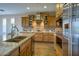 Kitchen with stainless steel appliances and granite island at 17676 E Woolsey Way, Rio Verde, AZ 85263