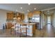 Modern kitchen with light wood cabinets and granite countertops at 17676 E Woolsey Way, Rio Verde, AZ 85263