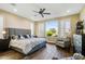 Main bedroom with large windows, mountain views, and sitting area at 17676 E Woolsey Way, Rio Verde, AZ 85263