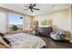 Main bedroom with large windows, mountain views and sitting area at 17676 E Woolsey Way, Rio Verde, AZ 85263