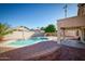 Inviting backyard oasis with a sparkling pool and covered patio at 1872 E Shannon St, Chandler, AZ 85225