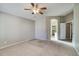 Large bedroom with carpeted floors and access to the bathroom at 1872 E Shannon St, Chandler, AZ 85225