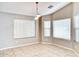 Bright dining room featuring tile floors and large windows with blinds at 1872 E Shannon St, Chandler, AZ 85225