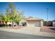 Single-story house with a two-car garage and desert landscaping at 1872 E Shannon St, Chandler, AZ 85225