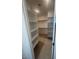 Spacious walk-in closet with built-in shelving at 18950 W Stella Ave, Waddell, AZ 85355