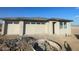 New construction home with attached two-car garage and desert landscaping at 19008 W Stella Ave, Waddell, AZ 85355