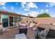 Relaxing backyard oasis with patio furniture and a hot tub at 19019 N Camino Del Sol --, Sun City West, AZ 85375