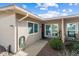 Home's exterior features a walkway, landscaping, and a small patio with seating at 19019 N Camino Del Sol --, Sun City West, AZ 85375