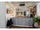 Kitchen counter with gray cabinets and granite top, offering ample workspace at 19019 N Camino Del Sol --, Sun City West, AZ 85375