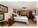 Main bedroom with wood-look floors and a wall of built-in storage at 19019 N Camino Del Sol --, Sun City West, AZ 85375