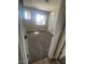 Well-lit bedroom with neutral walls and carpet flooring at 19026 W Stella Ave, Waddell, AZ 85355