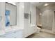 Modern bathroom with a large shower and double vanity at 200 W Portland St # 1312, Phoenix, AZ 85003