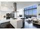 Modern kitchen with stainless steel appliances and island seating at 200 W Portland St # 1312, Phoenix, AZ 85003