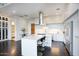 Contemporary kitchen featuring a large island and dark hardwood floors at 200 W Portland St # 1312, Phoenix, AZ 85003